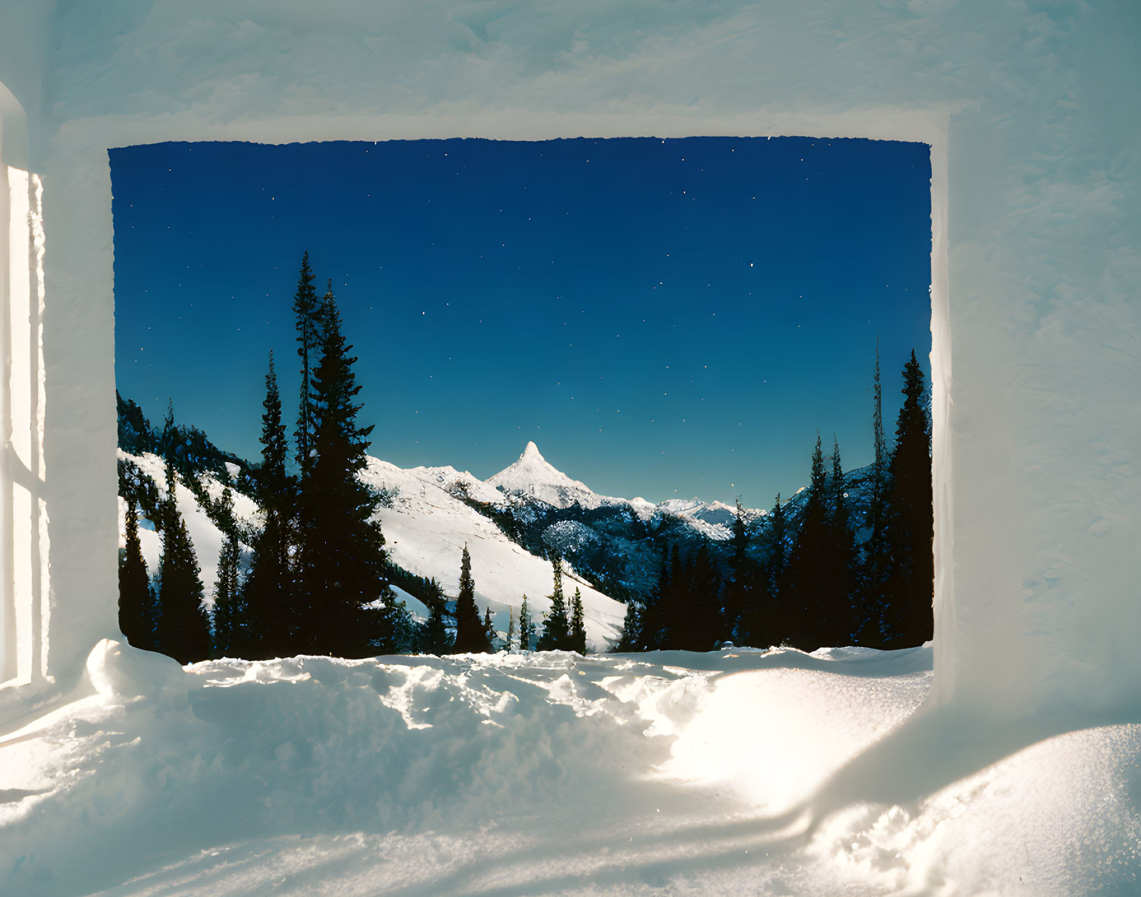 Snowy Scene: Square Window View of Pine Forest & Mountain Peak