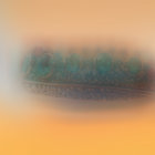 Crystal-Encrusted Green Bangle on Gradient Background