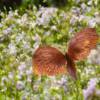 Monarch Butterflies on Pale Pink Flowers and Green Background