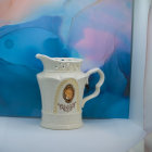 Tranquil scene with fresh flowers and cup on white tablecloth.