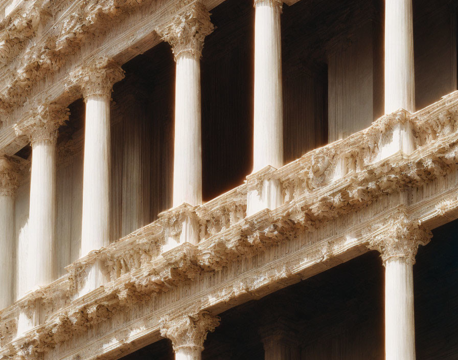 Detailed view of illuminated Corinthian columns in classical architecture