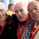 Elderly military men with medals and white beards among soldiers