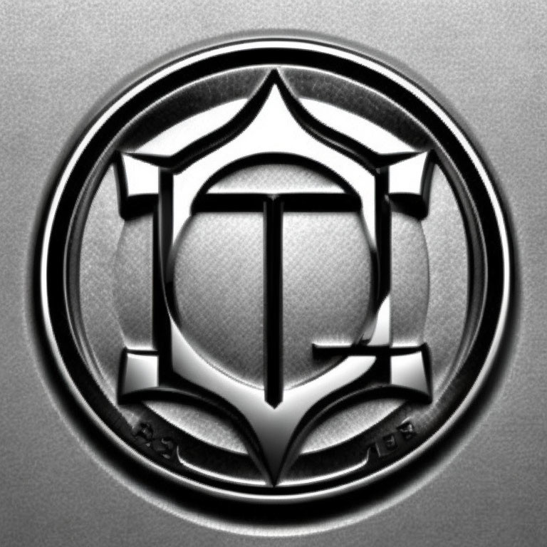 Metallic Emblem with Stylized "T" Letter on Shield with Date