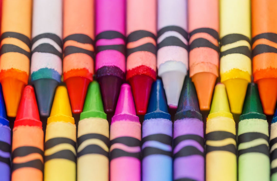 Vibrant Spectrum of Sharpened Crayons in Rows