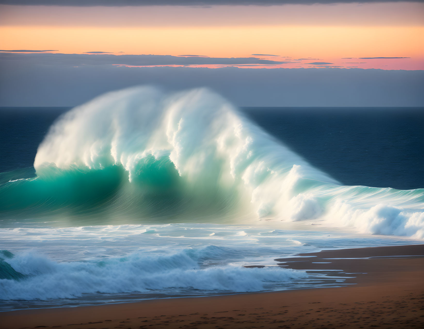 Backlit wave at sunrise with sandy beach