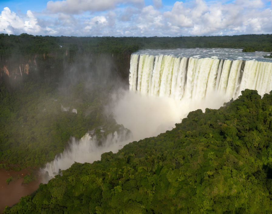 Majestic waterfall cascading into lush forest