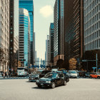 Desolate post-apocalyptic cityscape with burnt cars and derelict skyscraper