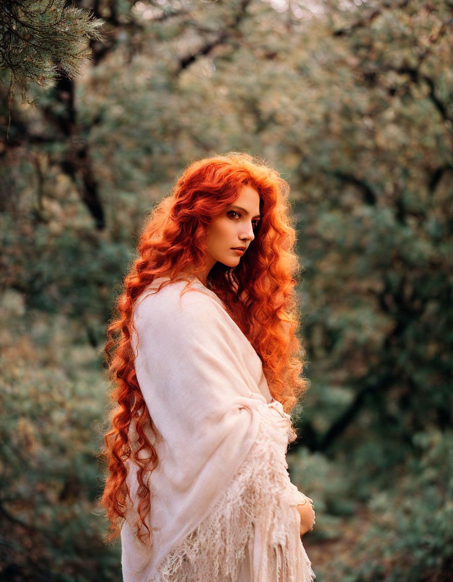 Red-haired woman in cream shawl gazes intensely in forest