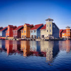 Vivid Reflections of Colorful Houses on Calm Water