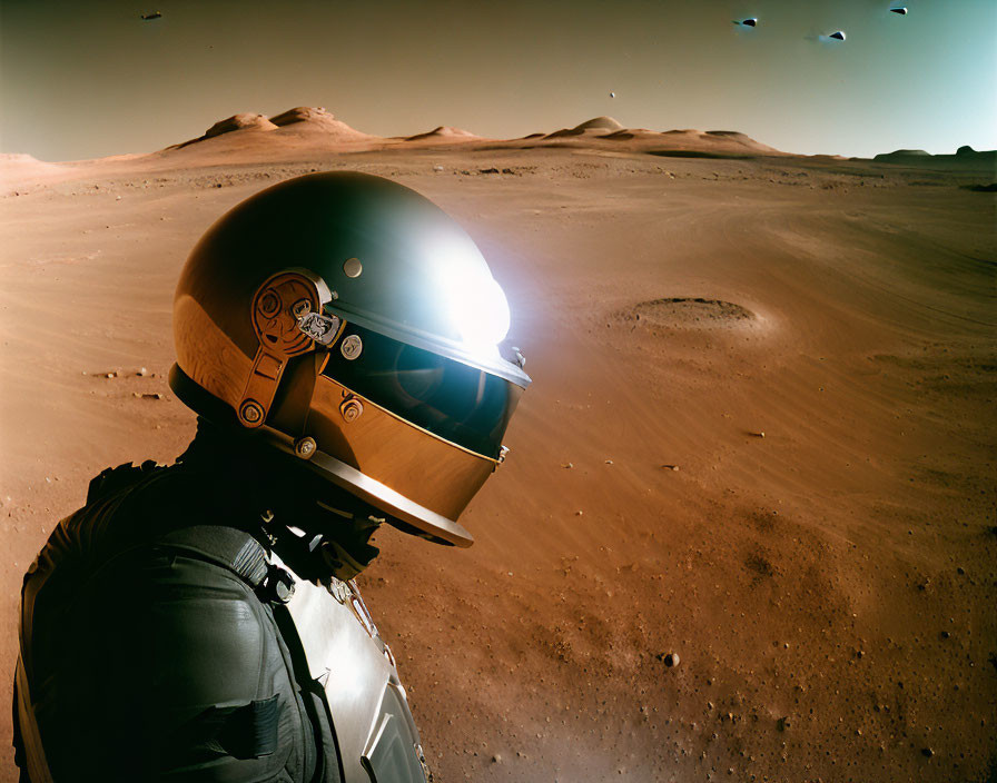 Astronaut in reflective helmet on barren Martian landscape