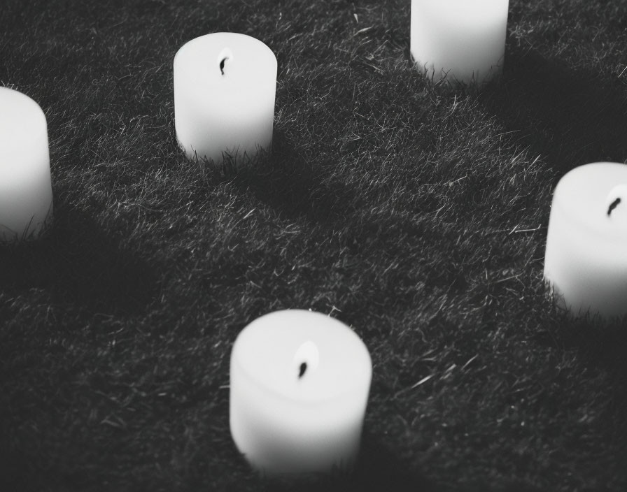 Monochromatic White Pillar Candles on Fuzzy Surface