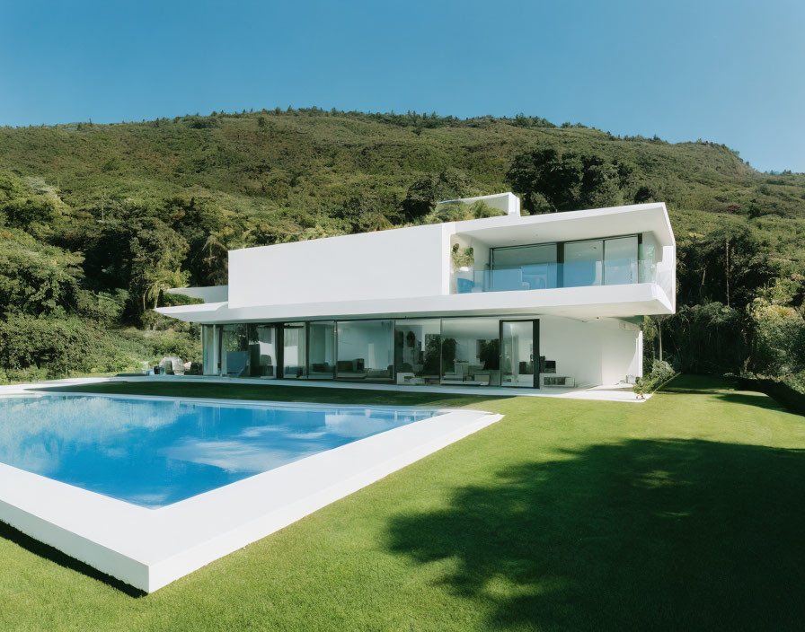 Stunning White Villa with Large Windows and Outdoor Pool