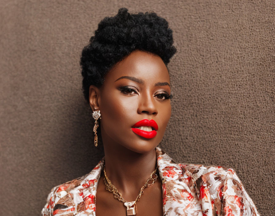 Stylish woman with red lipstick, curly updo, floral top