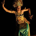 Elaborate Golden Headdress and Green Costume in Dramatic Pose