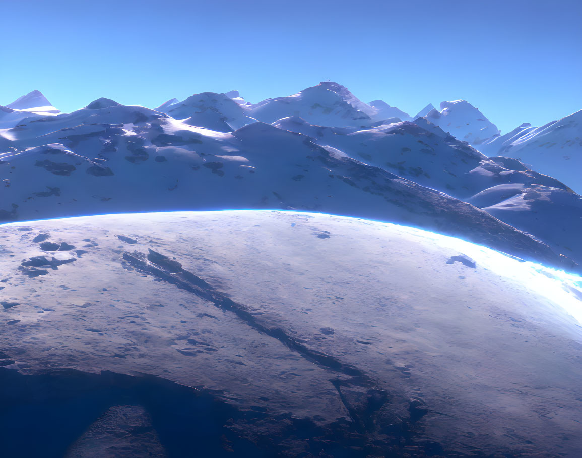 Majestic snow-covered mountains under clear blue sky