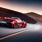 Red sports car on asphalt road at sunset with glowing taillights