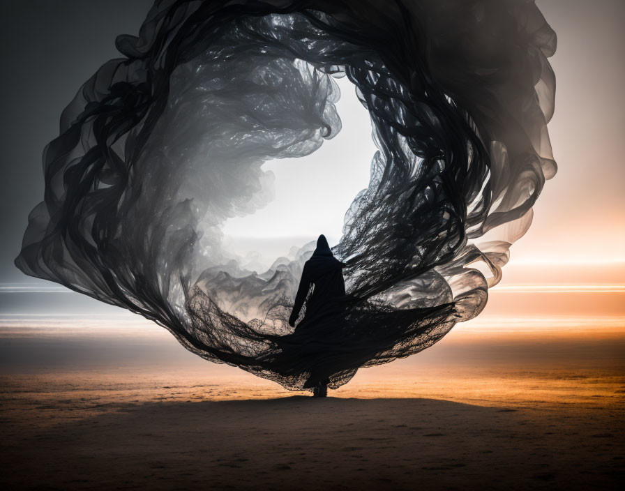 Silhouette of person on beach at sunset with swirling cloth.