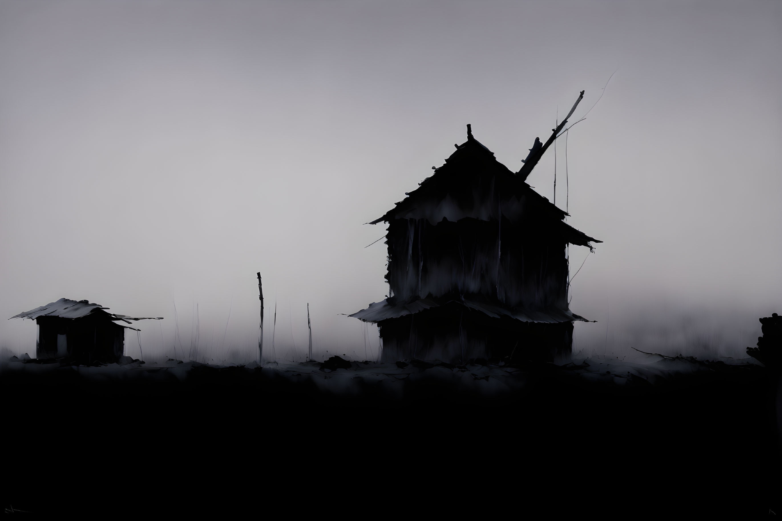 Silhouetted abandoned house and smaller structure in misty setting