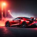 Red sports car parked at night under illuminated street lights in misty background