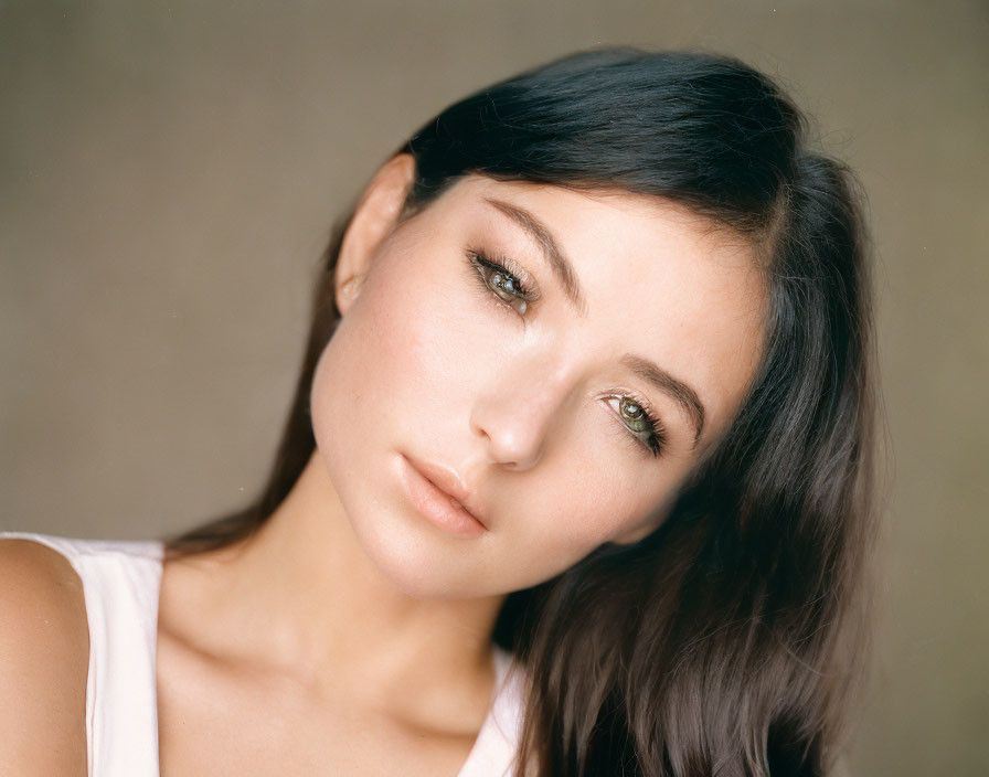 Portrait of Woman with Dark Hair, Fair Skin, and Green Eyes