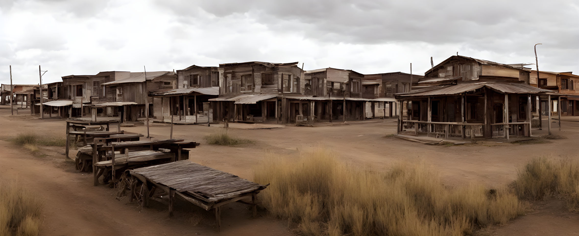 Deserted Western ghost town with dilapidated buildings