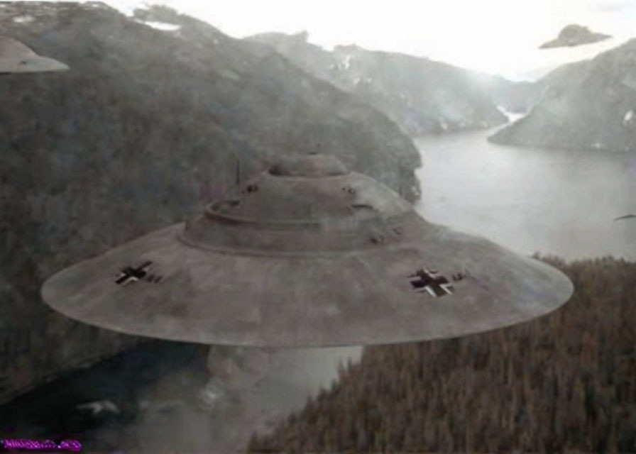 Unidentified Flying Object hovers over mountainous terrain