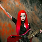 Vibrant red-haired woman with tattoos holding electric guitar in dark outfit against rusty backdrop