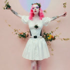 Pink-haired person in white dress with tattoos holding flowers on pink background with purple circle