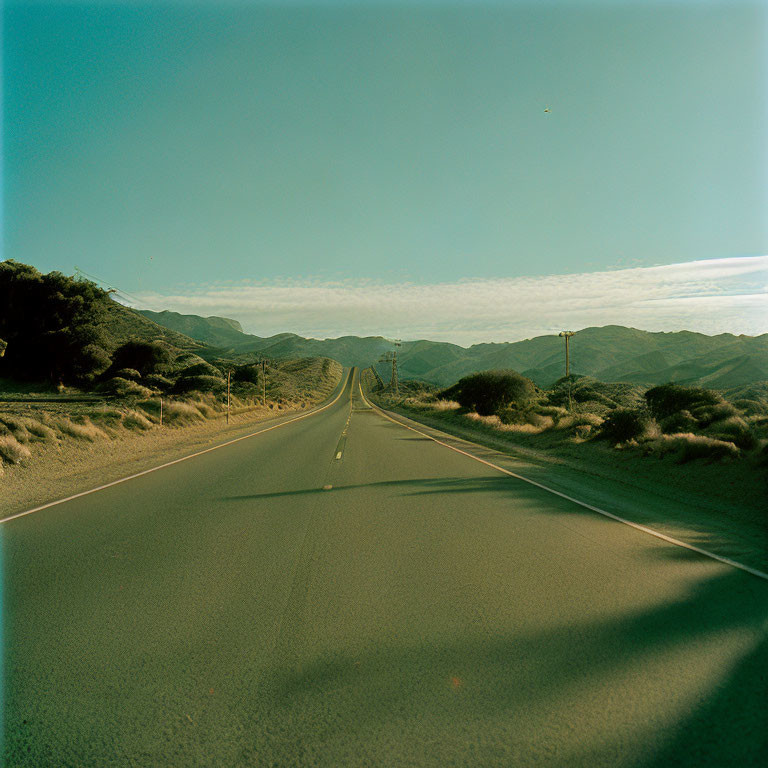 Tranquil Two-Lane Road in Green Hills