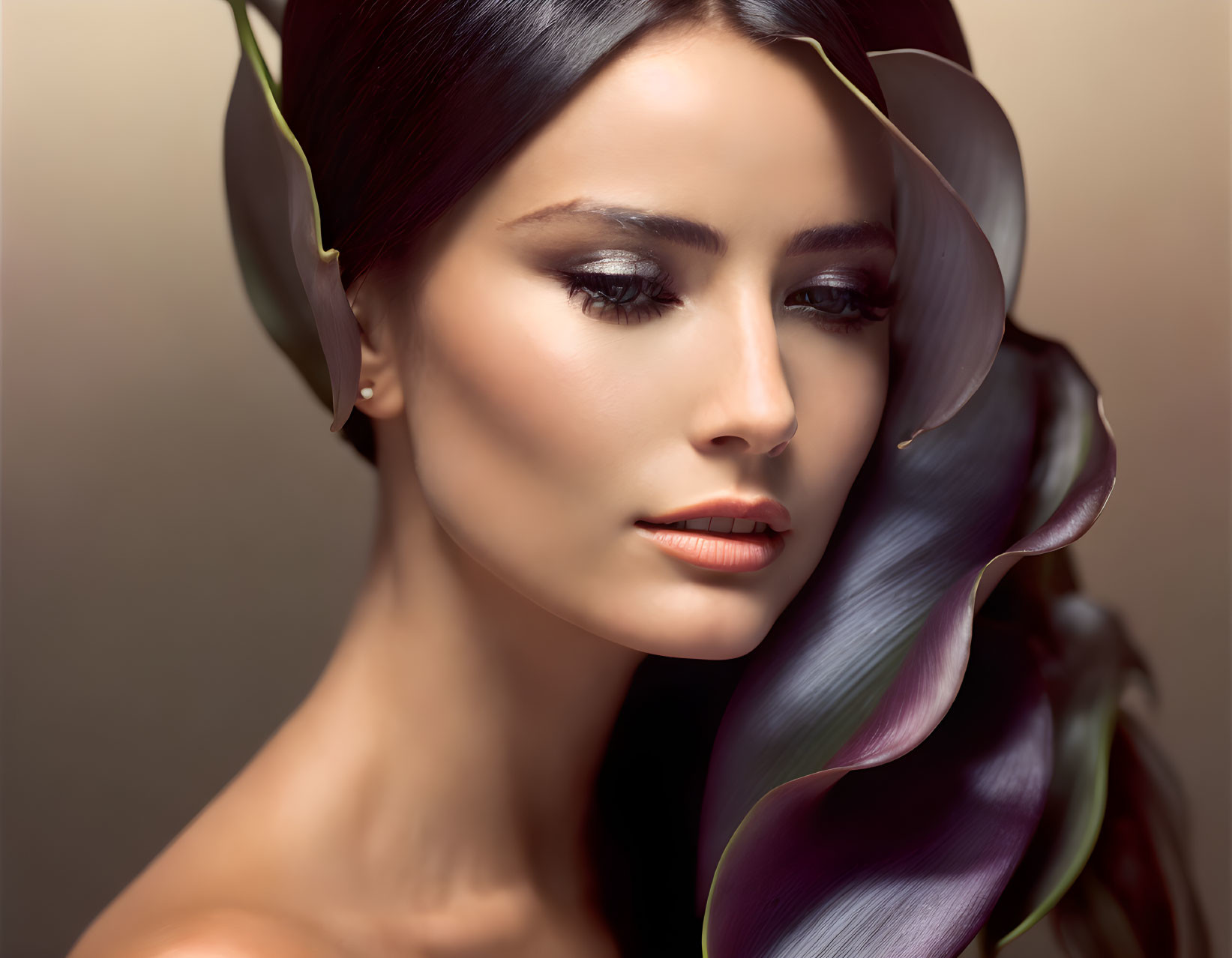 Portrait of woman with smooth skin, smokey eye makeup, dark hair, and dark calla l