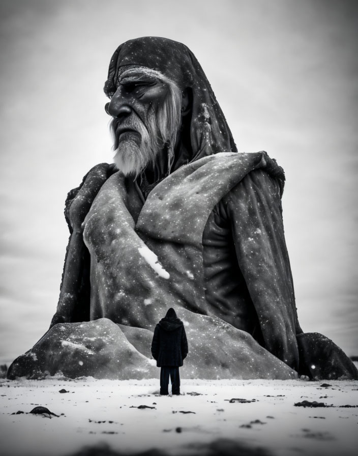 Large Sculpture of Old Man with Beard in Snowy Landscape