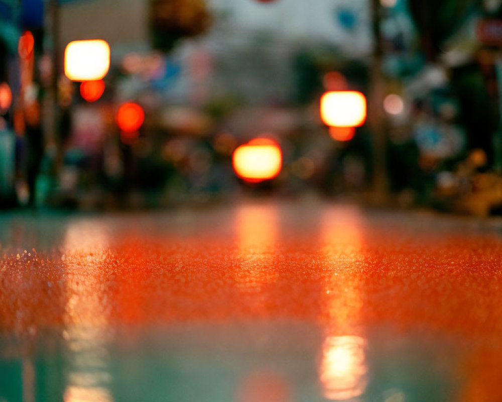 Colorful Bokeh Effect on Wet Street at Night