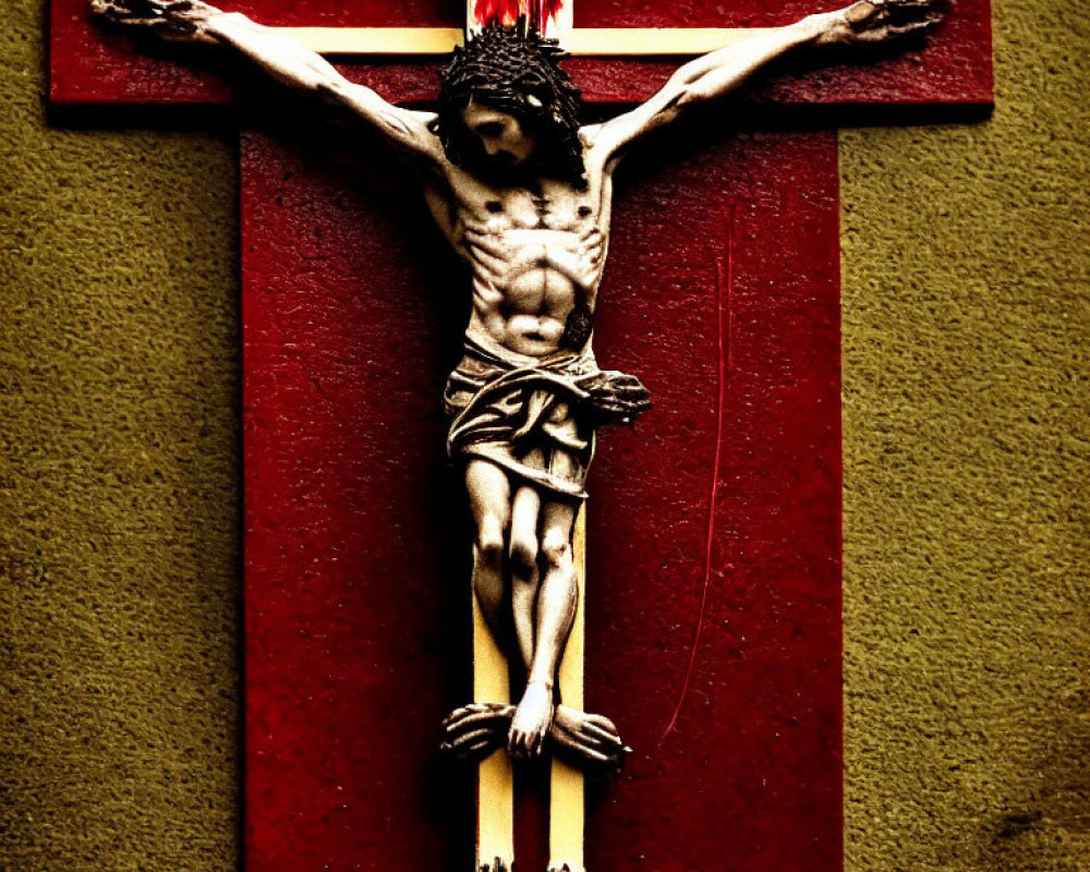 Close-up Crucifix with Jesus Figure and Crown of Thorns on Dark Background