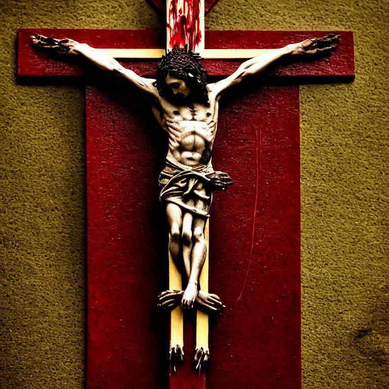 Close-up Crucifix with Jesus Figure and Crown of Thorns on Dark Background