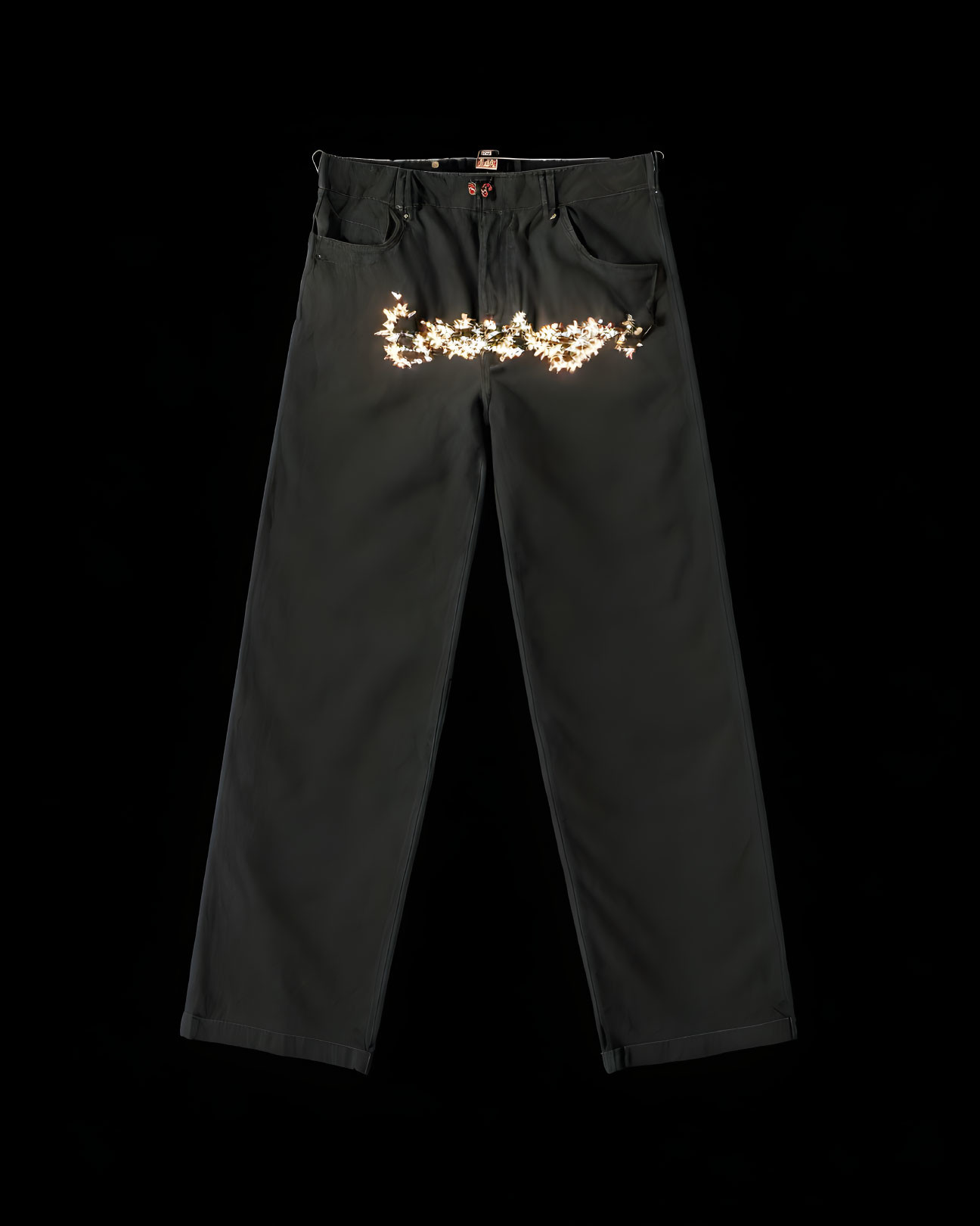 Embroidered floral design black trousers on black background