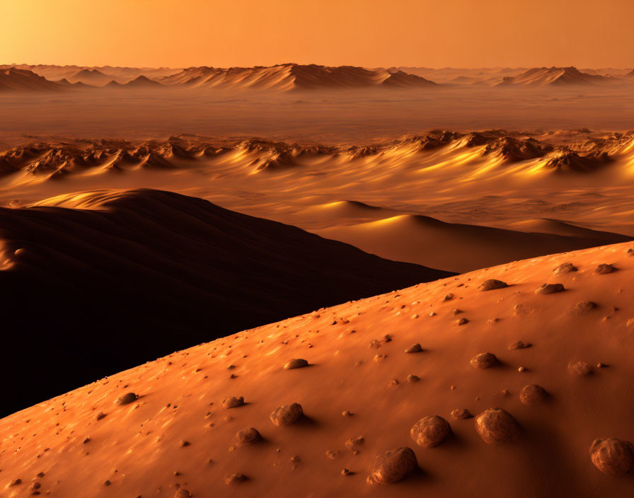 Golden Sand Dunes Under Hazy Sky and Shadows with Small Rocks