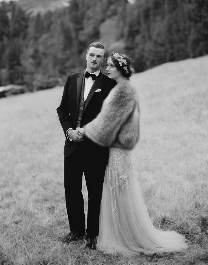 Formal Couple in Tuxedo and White Gown Outdoors