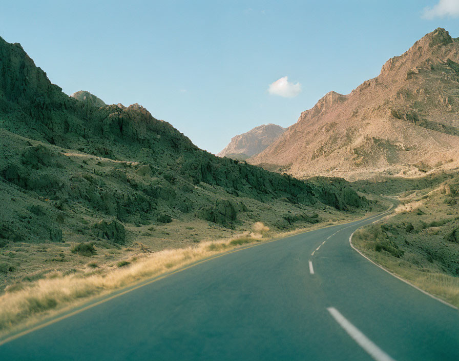 Winding Road in Rugged Mountain Landscape