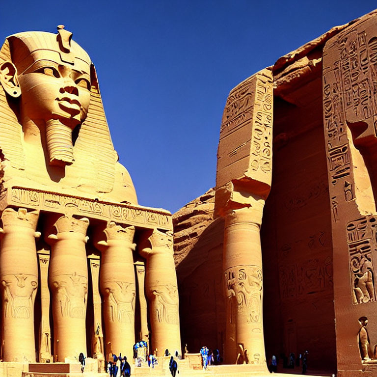 Colossal statues and hieroglyphics at Great Temple of Ramses II