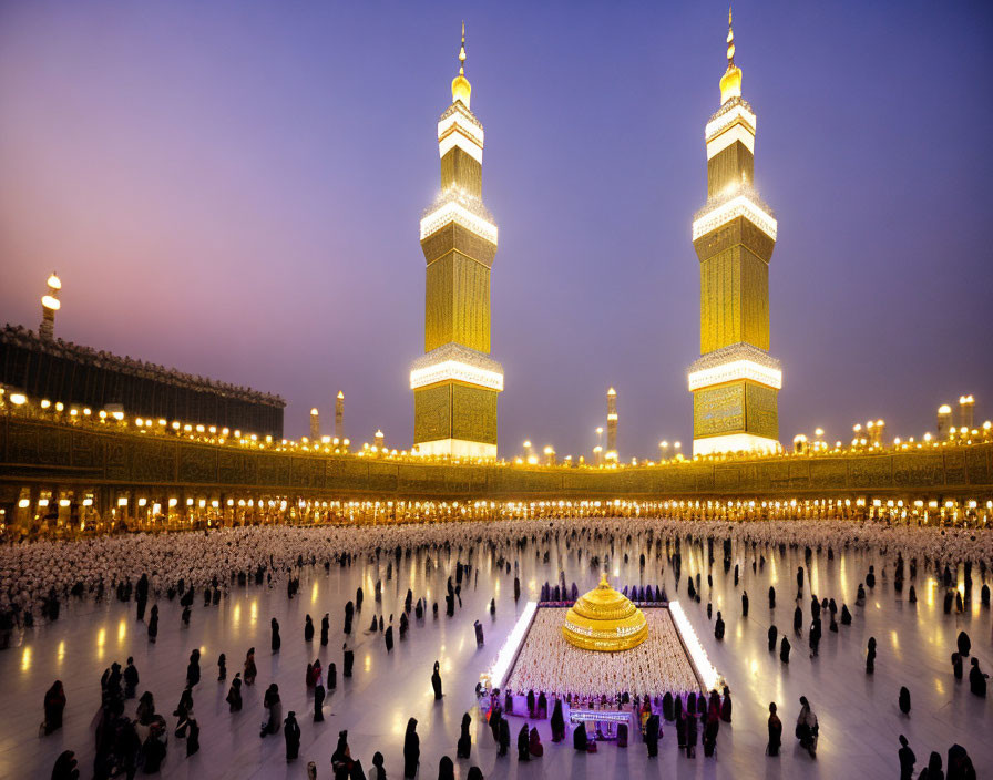 Night scene of worshippers at Kaaba in Mecca with illuminated minarets