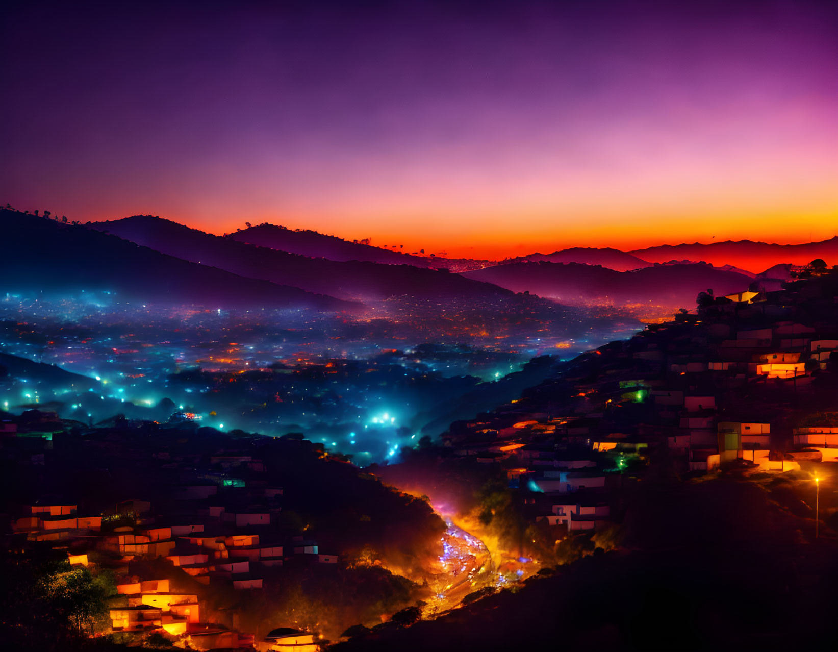 Colorful Twilight Sky Over Illuminated Hilly Region