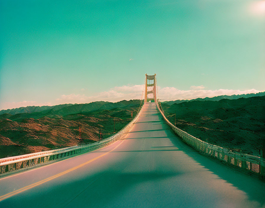 Serene suspension bridge over rolling hills in vintage filter