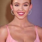 Digital portrait: Woman with blue eyes, wavy hair, pink dress, diamond earrings, cosmic backdrop