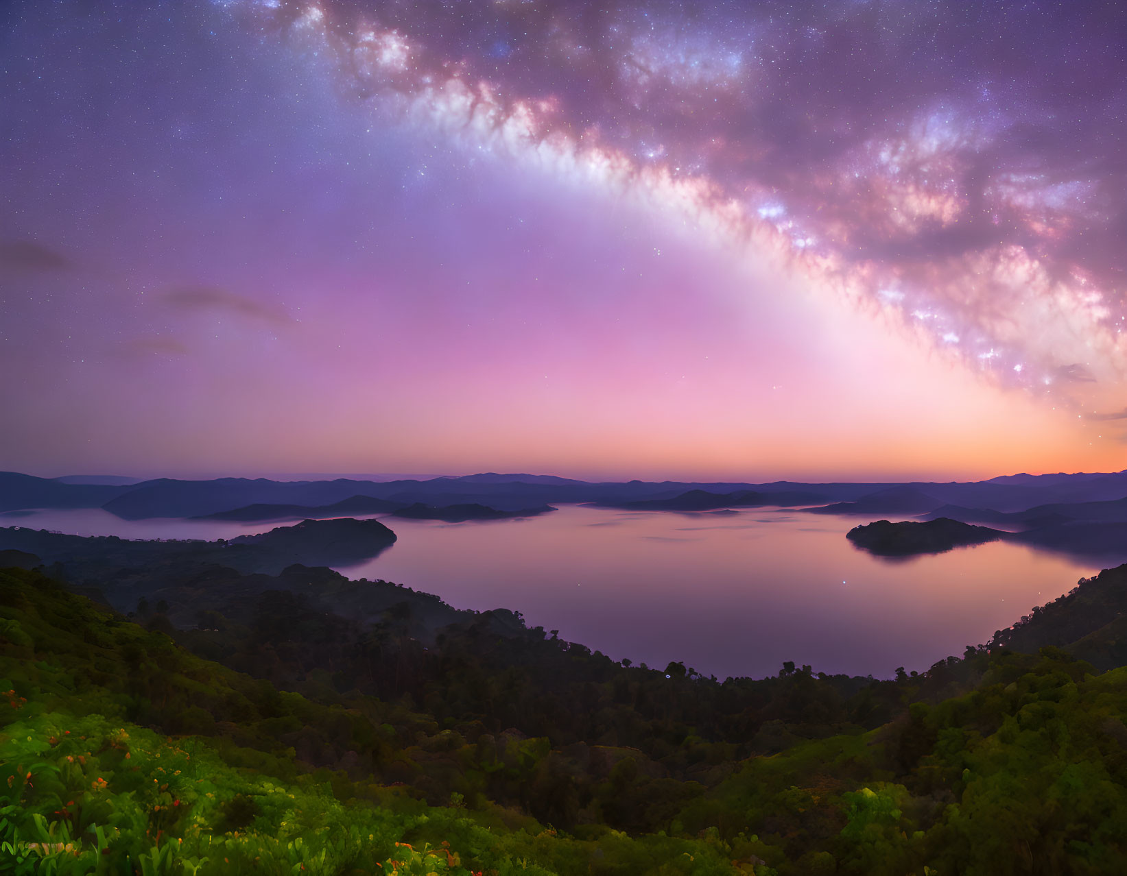 Tranquil landscape with starry sky, serene lake, rolling hills, and lush greenery