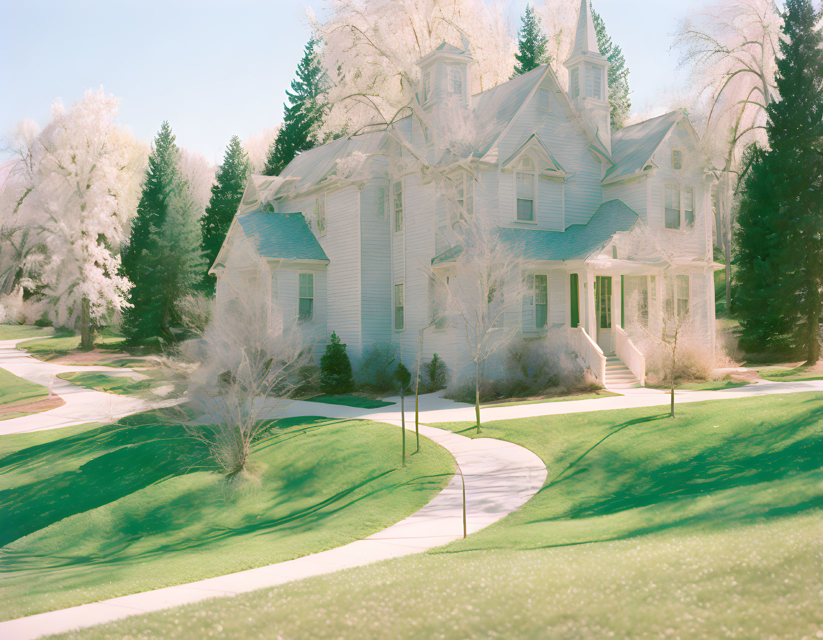 Spacious white house with gabled roof in serene green landscape