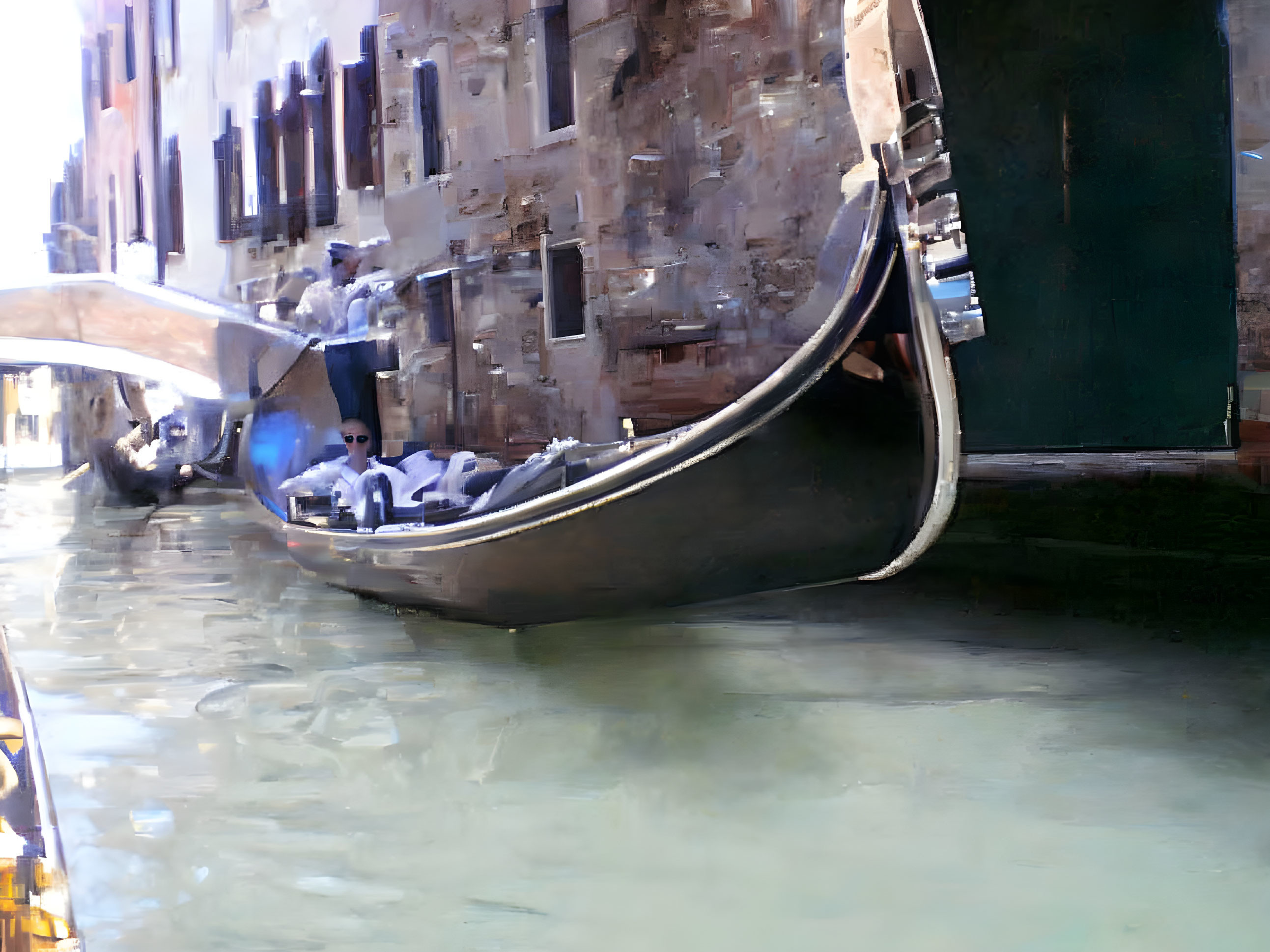 Gondolier navigating Venetian canal with old buildings