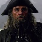 Fictional pirate portrait with grey beard and blue attire