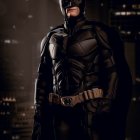 Detailed Batman costume with black mask, armor suit, utility belt, and cape.