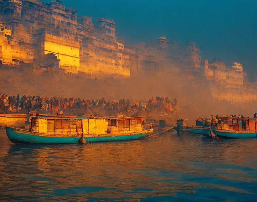 Sunlit misty river with boats and silhouettes by ancient waterfront