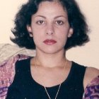 Classic Portrait of Woman with Wavy Hair and Red Lipstick